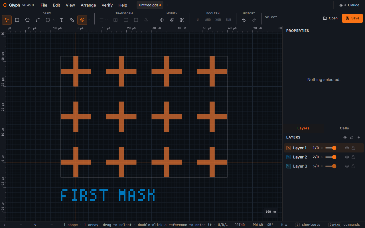 A first mask in Glyph: a 4×3 array of cross shapes on layer 1 with a stroke-font FIRST MASK label, zoomed to fit the canvas.
