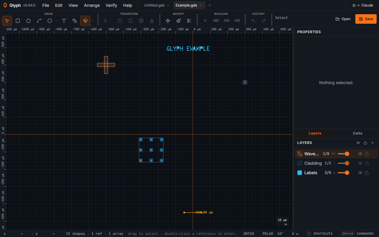 The Glyph editor with an example layout open: an alignment cross, a text label, an instanced array, and a pinned dimension across a nanometre grid, with the toolbar, Properties panel, and Layers panel around the canvas.