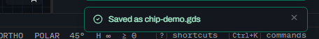 A Glyph toast notification reading Saved as chip-demo.gds with a green checkmark icon, over the status bar.