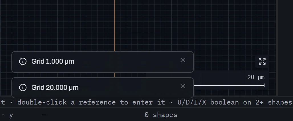The same canvas corner, panel edge and status bar, the scale bar now reading 20 micrometres above a longer ruler than the previous 10 micrometre shot, its left end under two stacked toasts reading Grid 1.000 micrometres and Grid 20.000 micrometres.